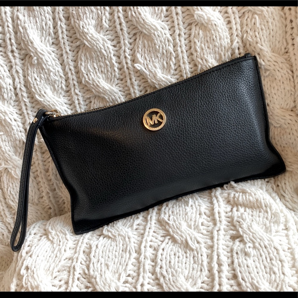 Micheal Kors black pebble leather clutch.